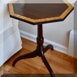 F43. Banded mahogany side table. 